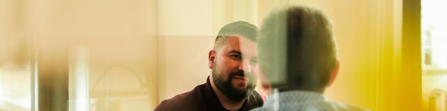 Two men in conversation