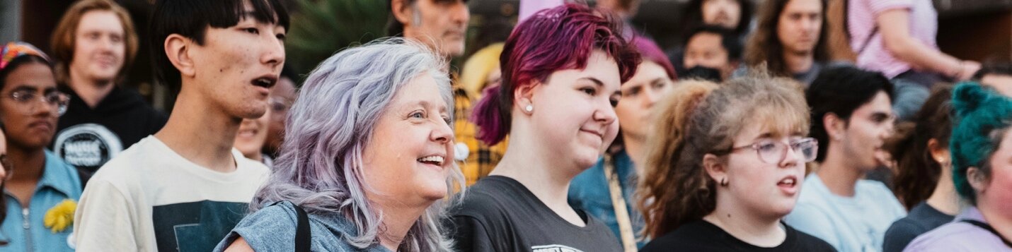 Older woman in a crowd